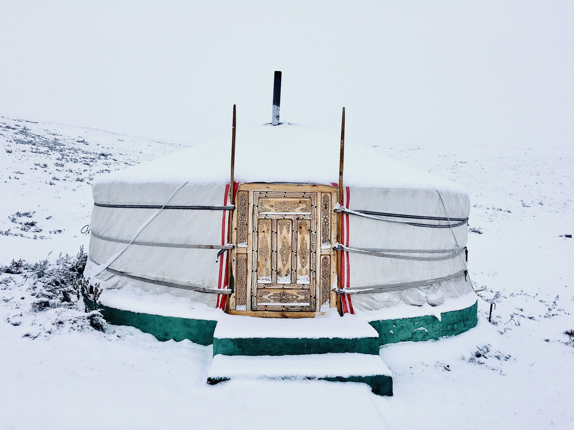 Yurt of this country at high altitude. High mountains experience varying temperatures.