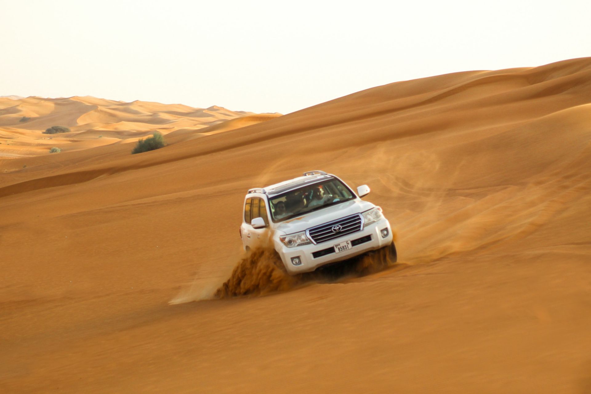 Toyota Landcruiser drifting on a sand dune