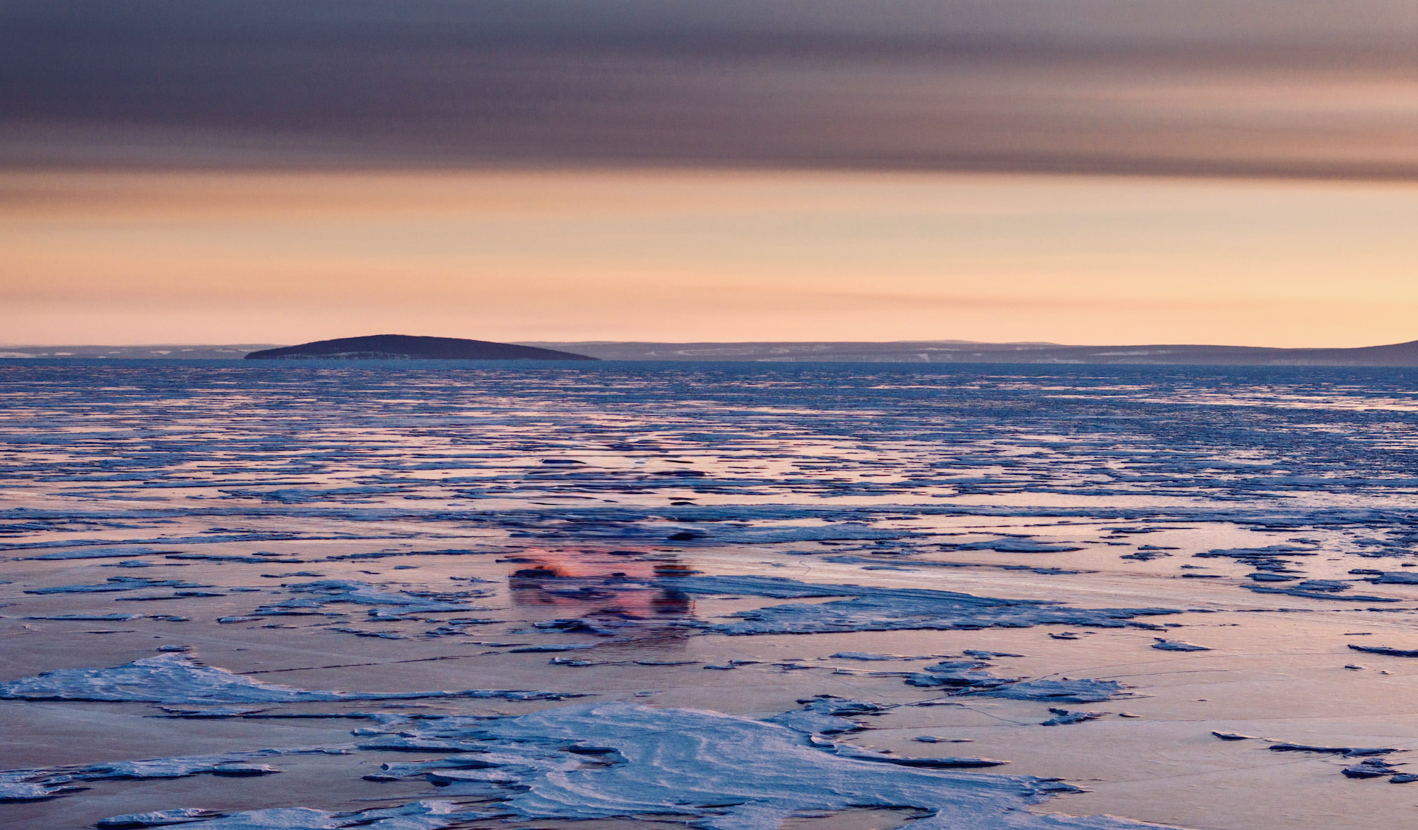 Mongolian winter temperature plunge, creating frigid winters with snow cover across mountain ranges.